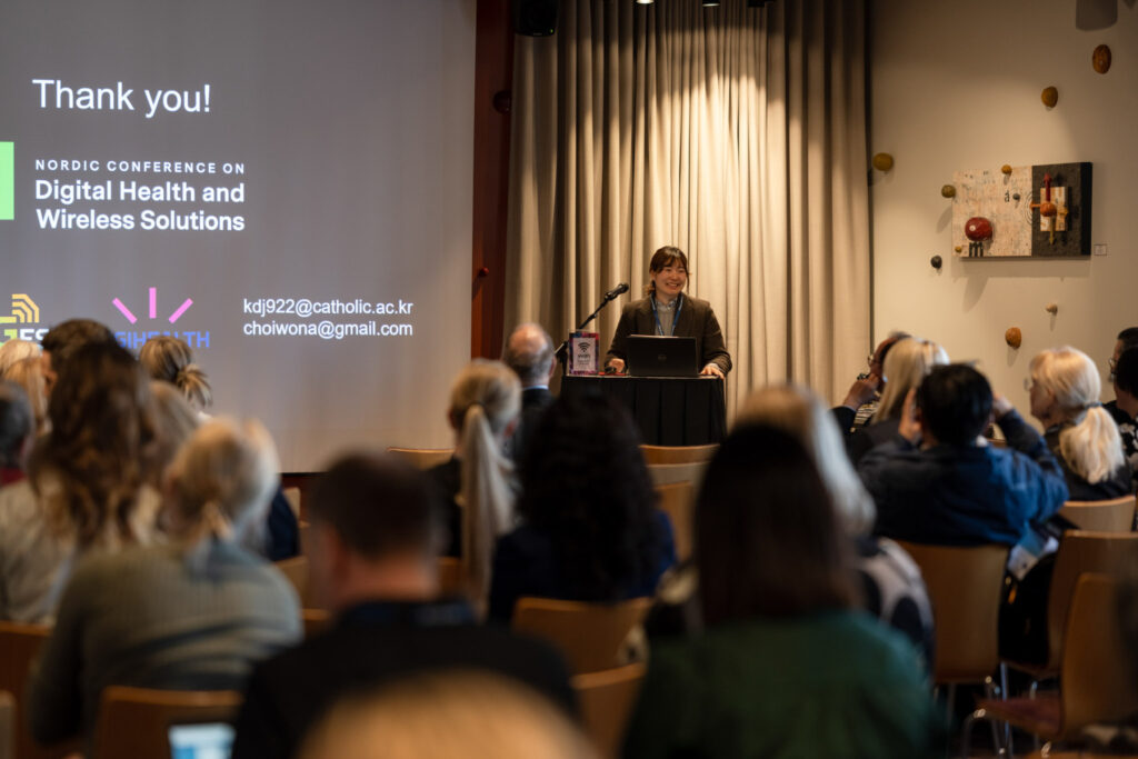 Audience listening carefully at the Nordic Conference on digital Health and Wireless Solutions.
